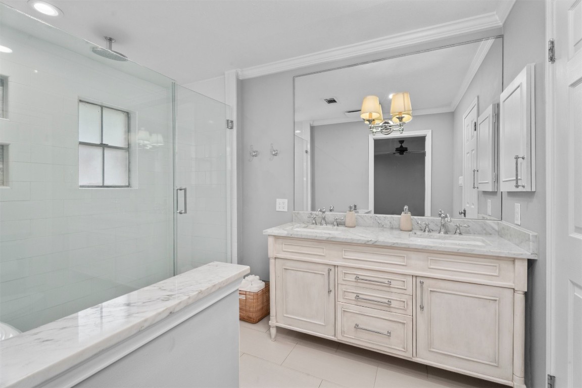 602 Aldersgate Court Katy, TX 77450 - Photo 8 of 24 a spacious bathroom with a granite countertop sink mirror and toilet