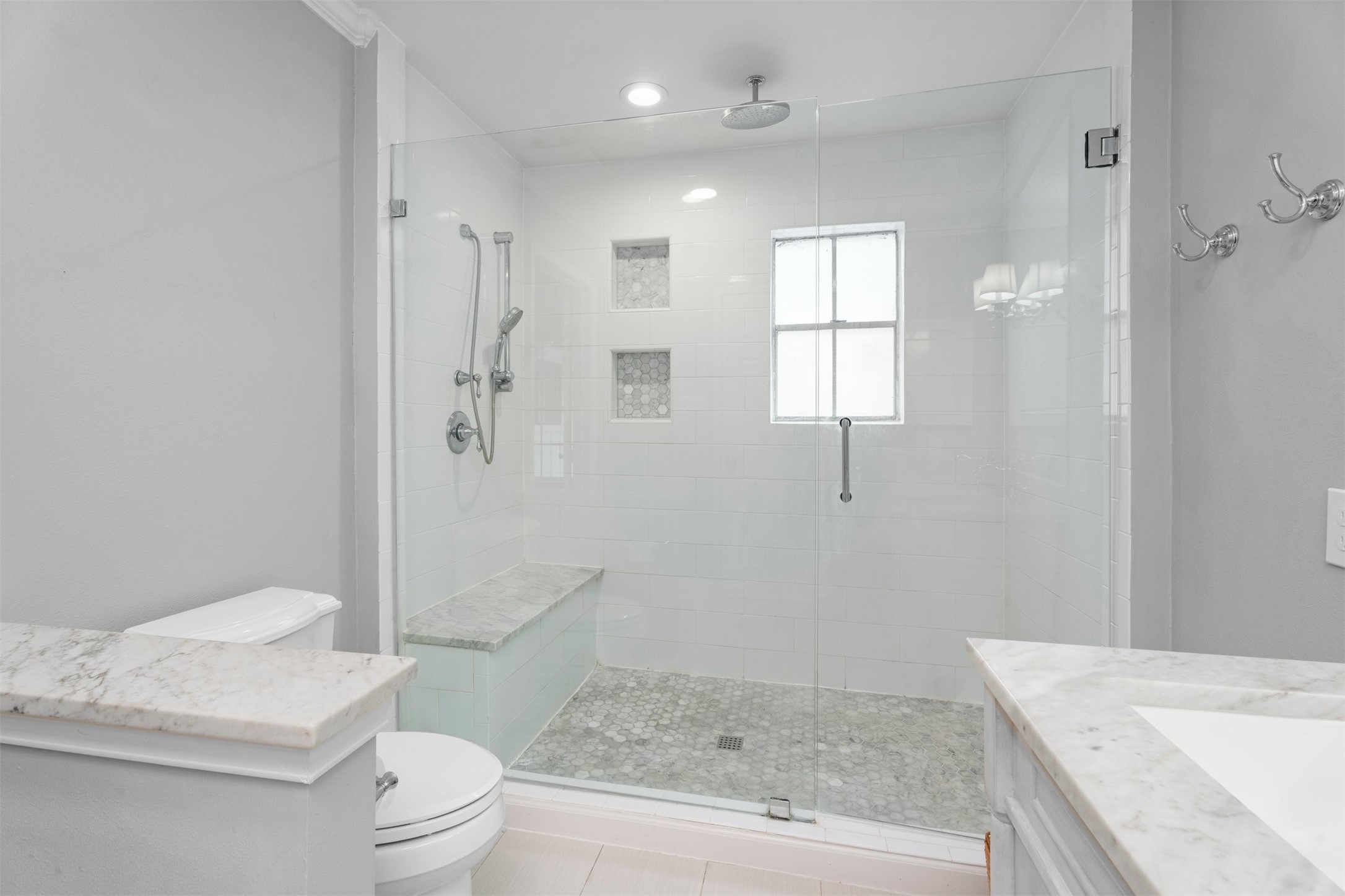 602 Aldersgate Court Katy, TX 77450 - Photo 9 of 24 a bathroom with a granite countertop sink a toilet and shower