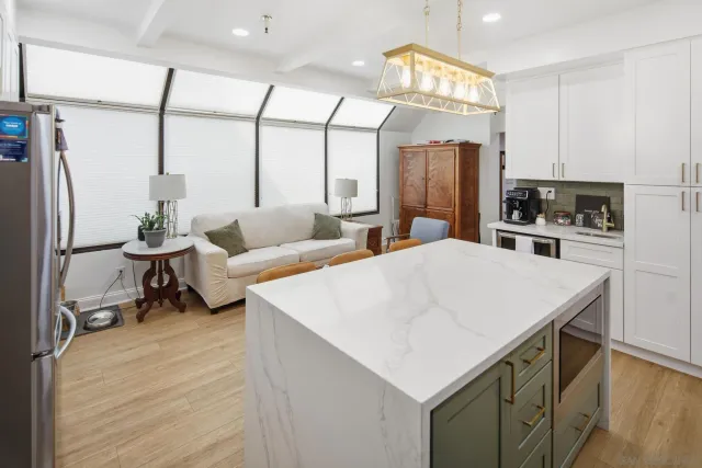 a room with furniture and a wooden floor