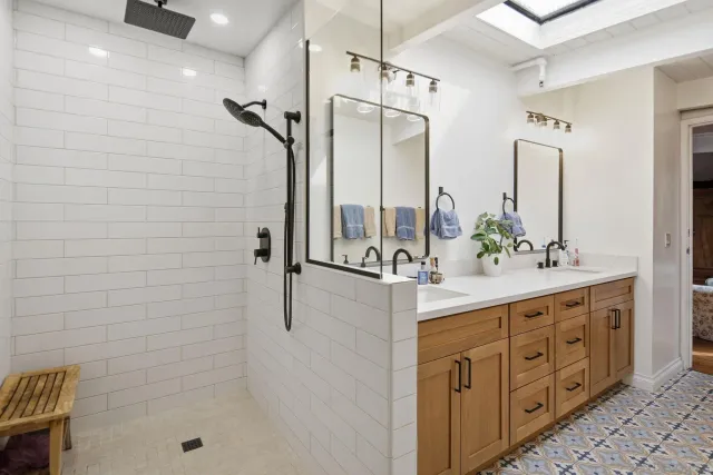 a living room with furniture and a book shelf