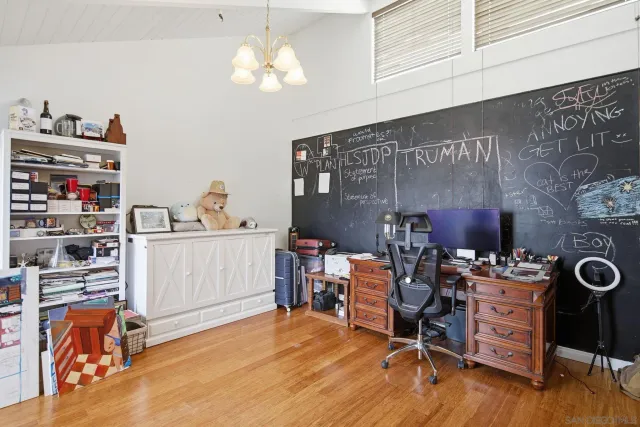 a view of parking garage with cars