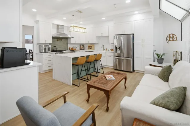 a kitchen with a stove and a sink