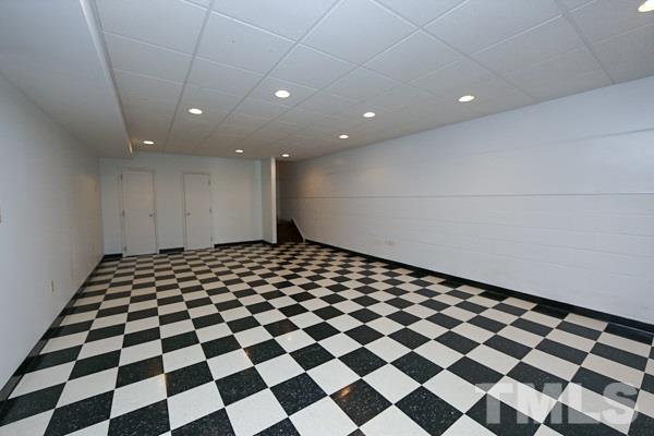 5712 Crutchfield Road Raleigh, NC 27606 - Photo 15 of 21 Bonus / rec room in basement. Plenty of room for a pool table, ping pong, etc.