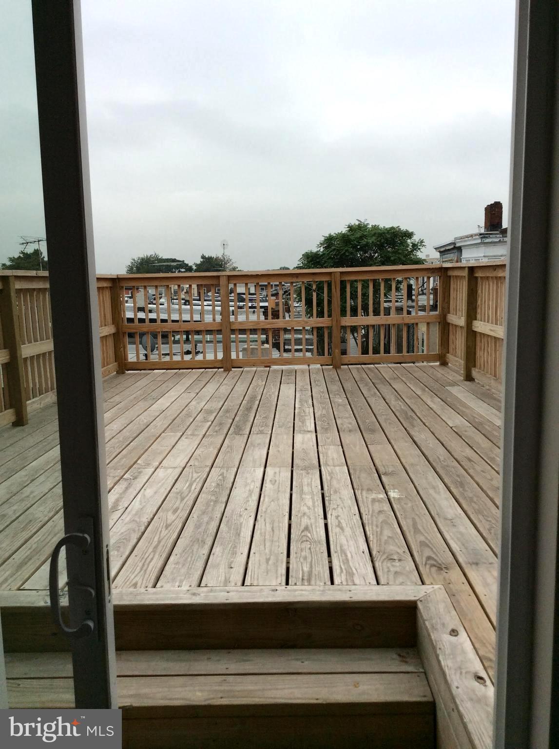 432 Tasker Street Philadelphia, PA 19148 - Photo 23 of 33 3rd floor -view of deck from inside unit