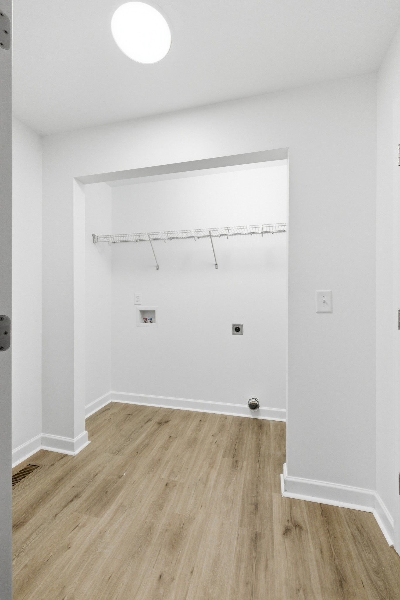 217 Spring Breeze Drive Smithville, TN 37166 - Photo 14 of 34 a view of a room with wooden floor