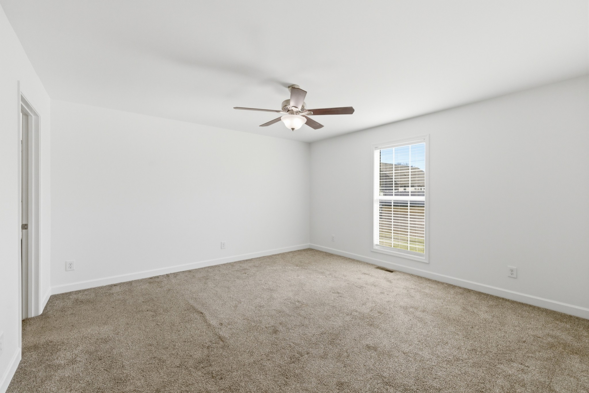 217 Spring Breeze Drive Smithville, TN 37166 - Photo 15 of 34 a view of an empty room with a window
