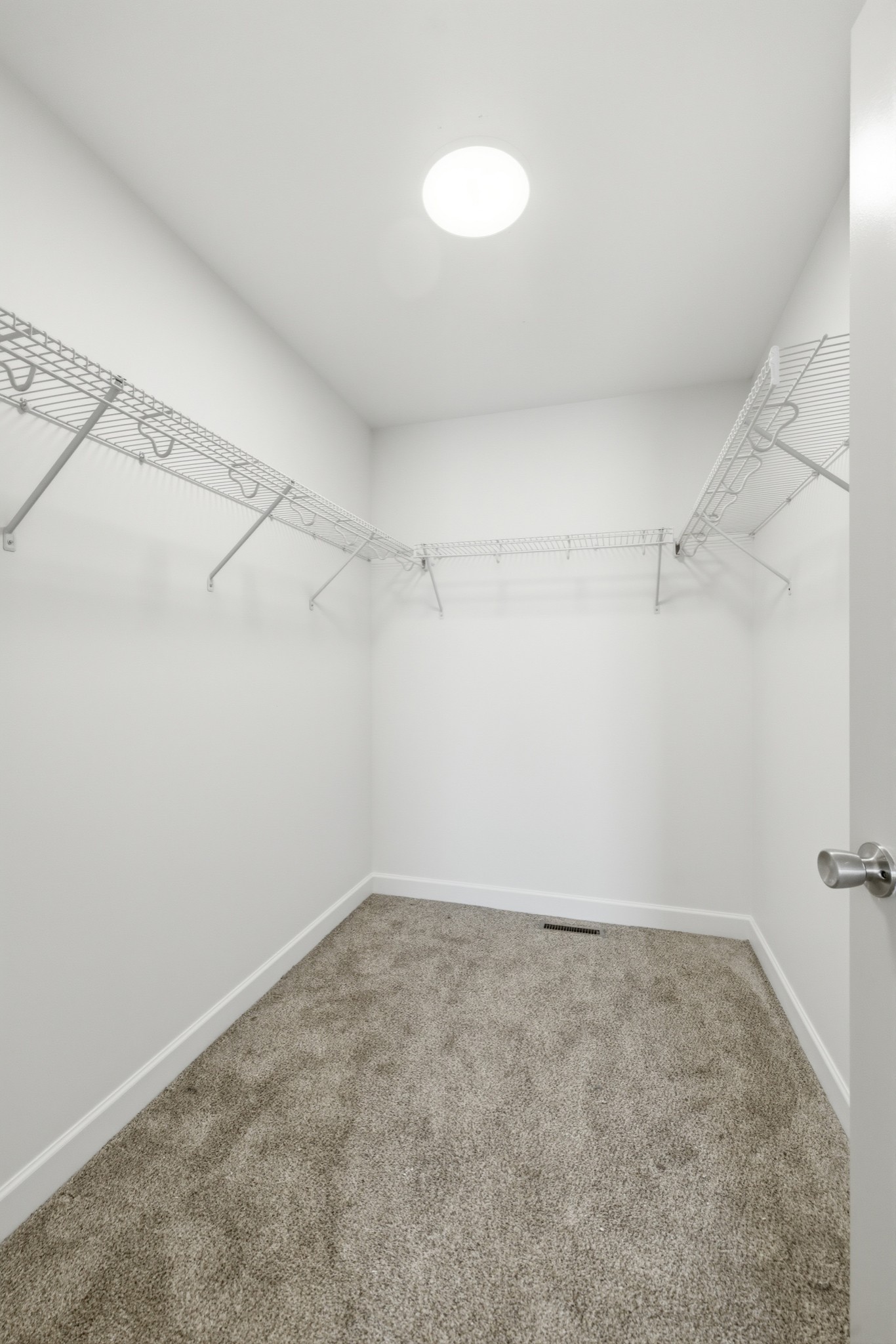 217 Spring Breeze Drive Smithville, TN 37166 - Photo 18 of 34 a view of a room with racks on the wall