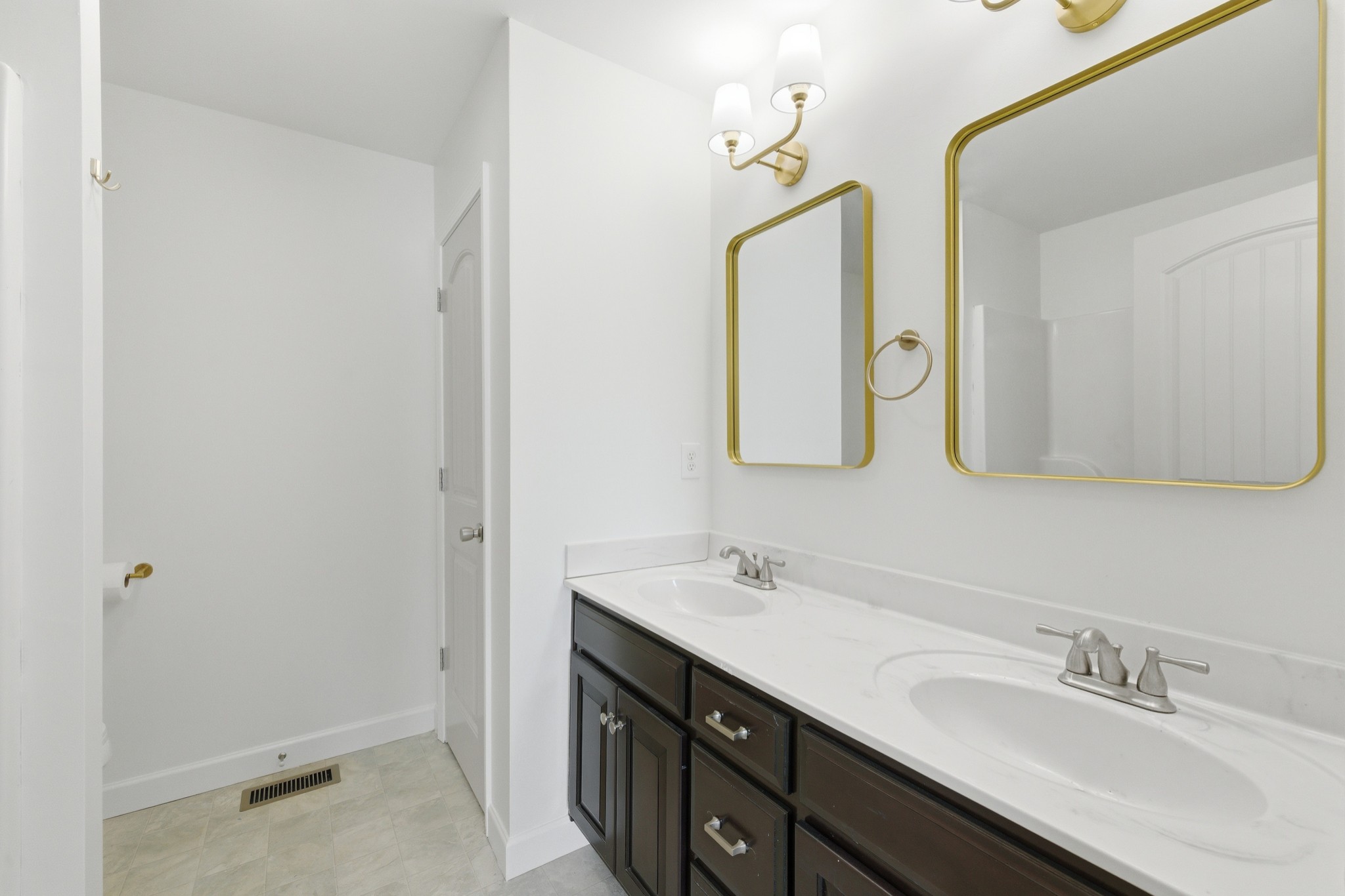 217 Spring Breeze Drive Smithville, TN 37166 - Photo 19 of 34 a bathroom with a double vanity sink mirror and