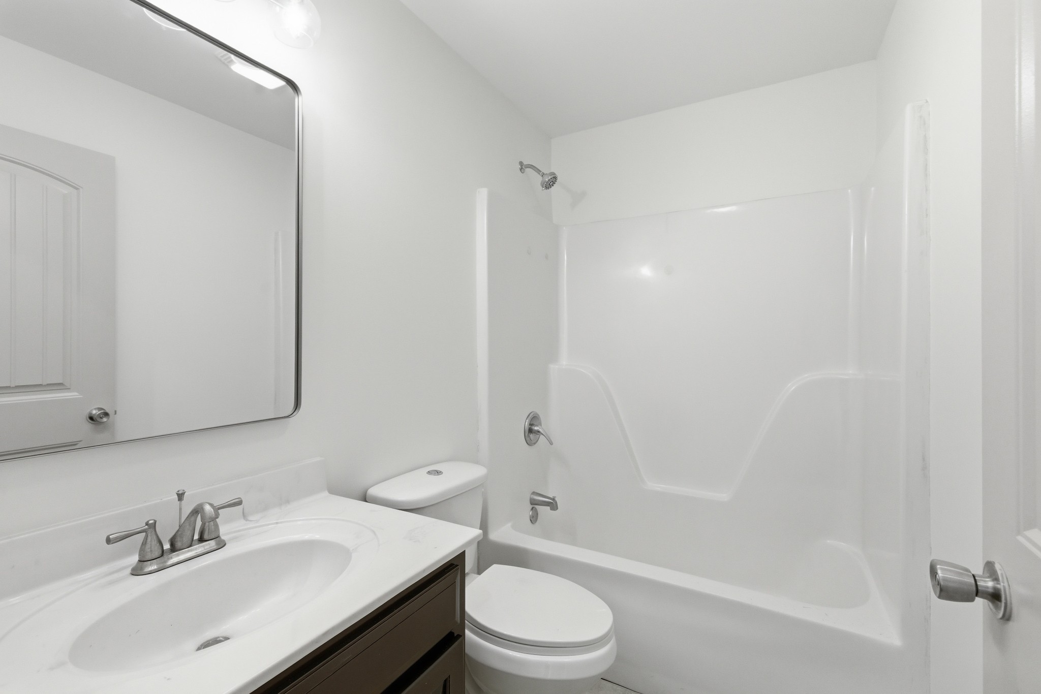 217 Spring Breeze Drive Smithville, TN 37166 - Photo 22 of 34 a bathroom with a sink toilet and shower