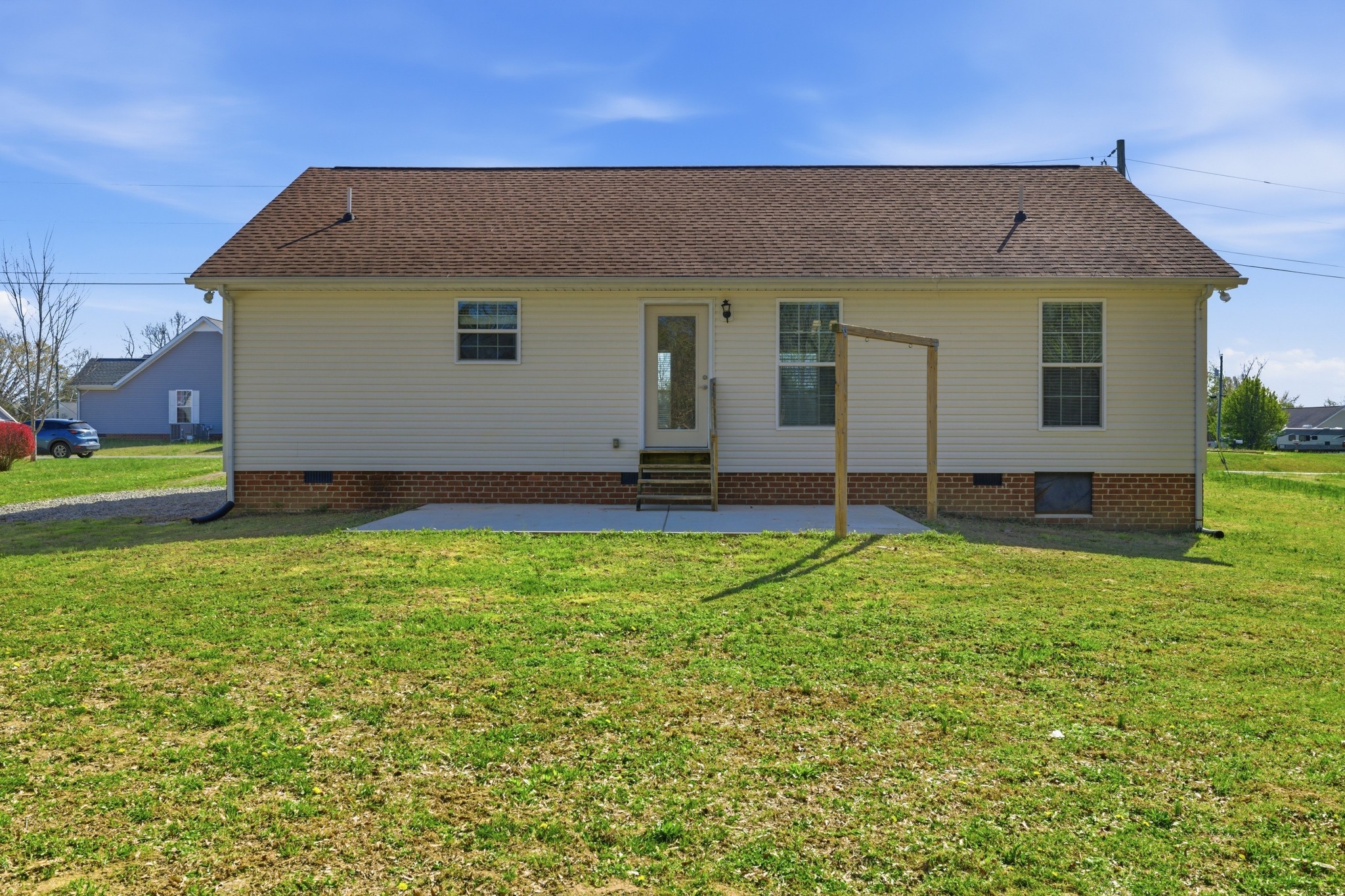 217 Spring Breeze Drive Smithville, TN 37166 - Photo 26 of 34 a front view of a house with garden