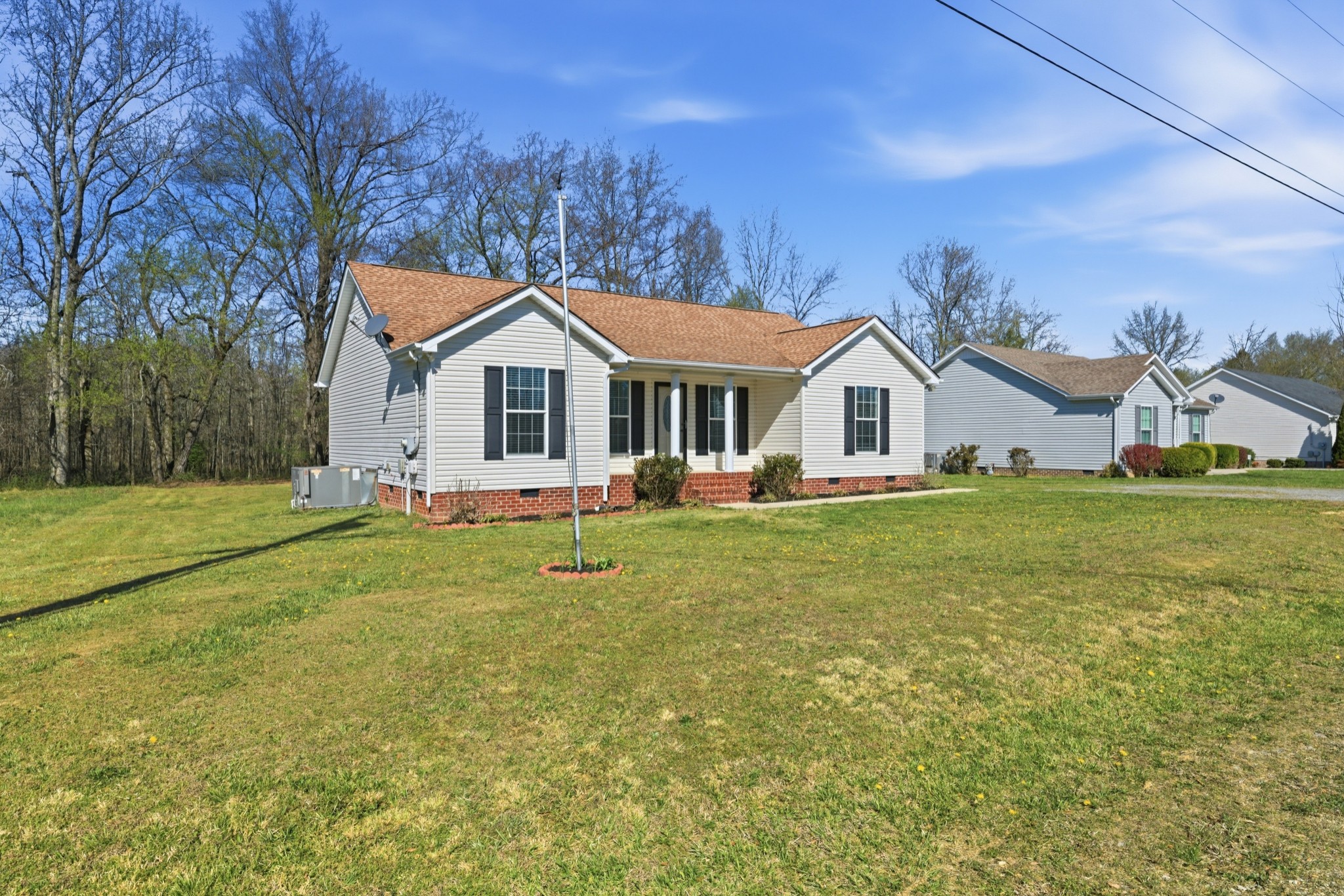 217 Spring Breeze Drive Smithville, TN 37166 - Photo 29 of 34 a front view of house with yard and green space