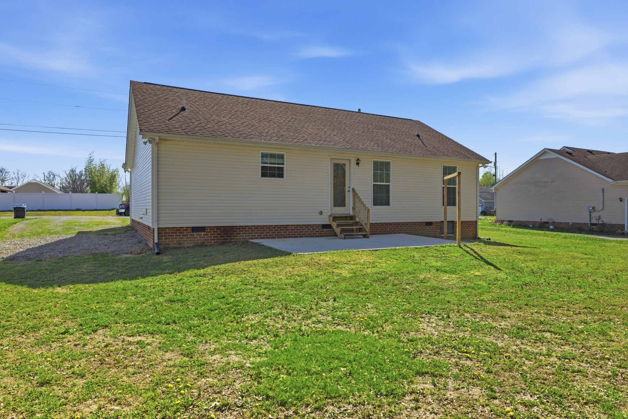 217 Spring Breeze Drive Smithville, TN 37166 - Photo 32 of 34 a backyard of a house with lots of green space