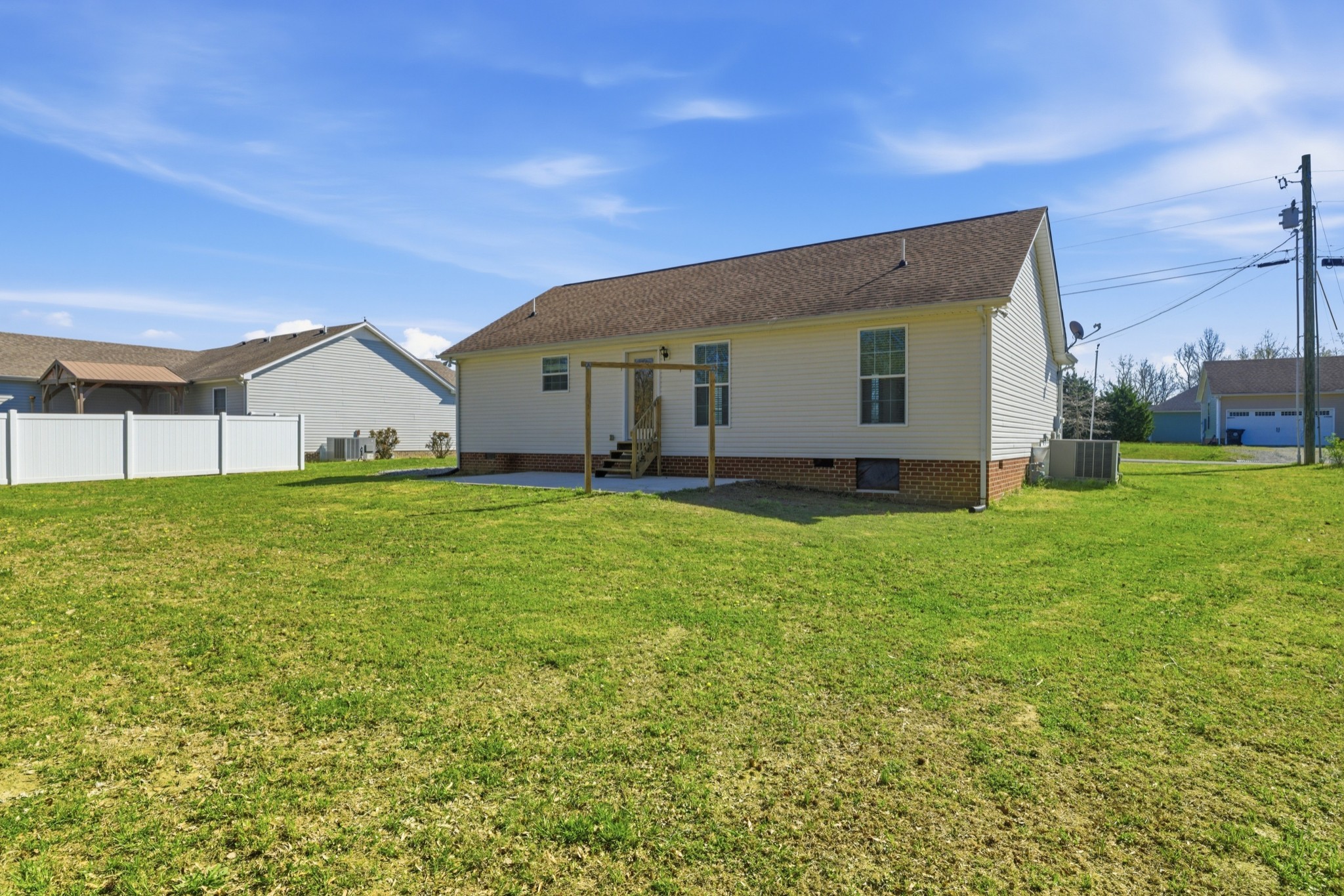 217 Spring Breeze Drive Smithville, TN 37166 - Photo 33 of 34 a view of a house with a yard