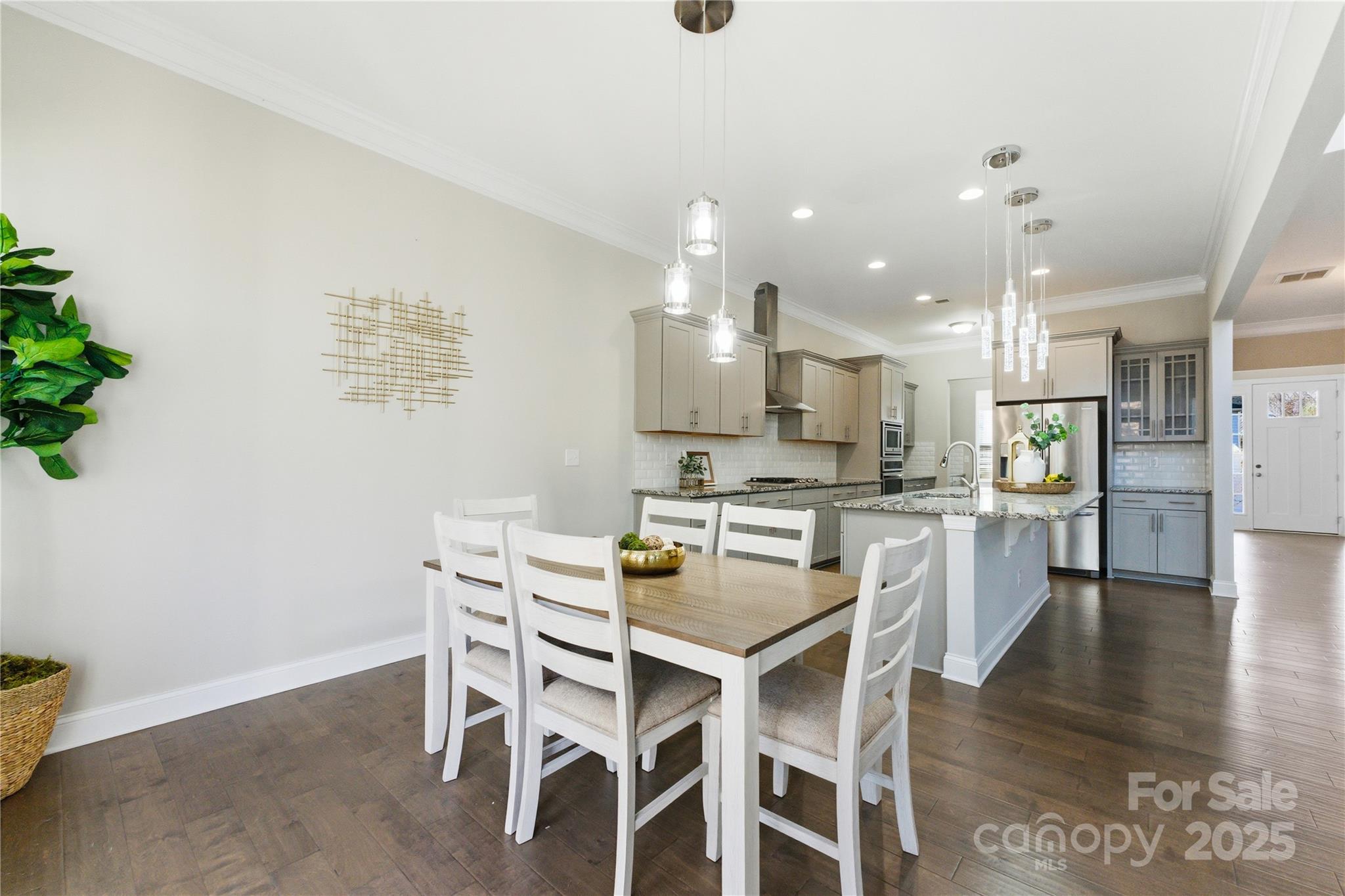 194 Forsythia Lane Tega Cay, SC 29708 - Photo 16 of 31 a kitchen with a table and chairs in it