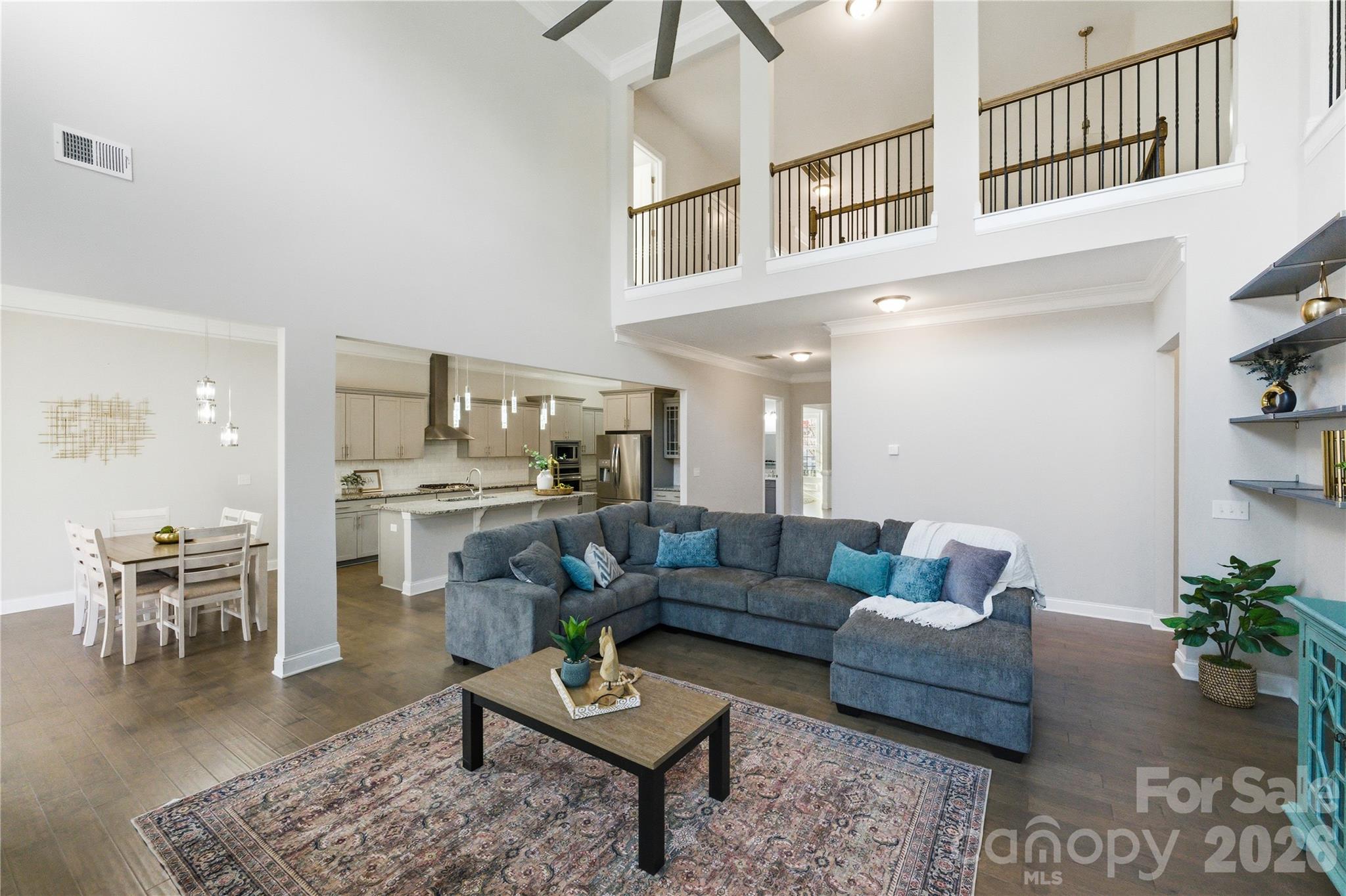 194 Forsythia Lane Tega Cay, SC 29708 - Photo 20 of 36 a living room with furniture and view of kitchen