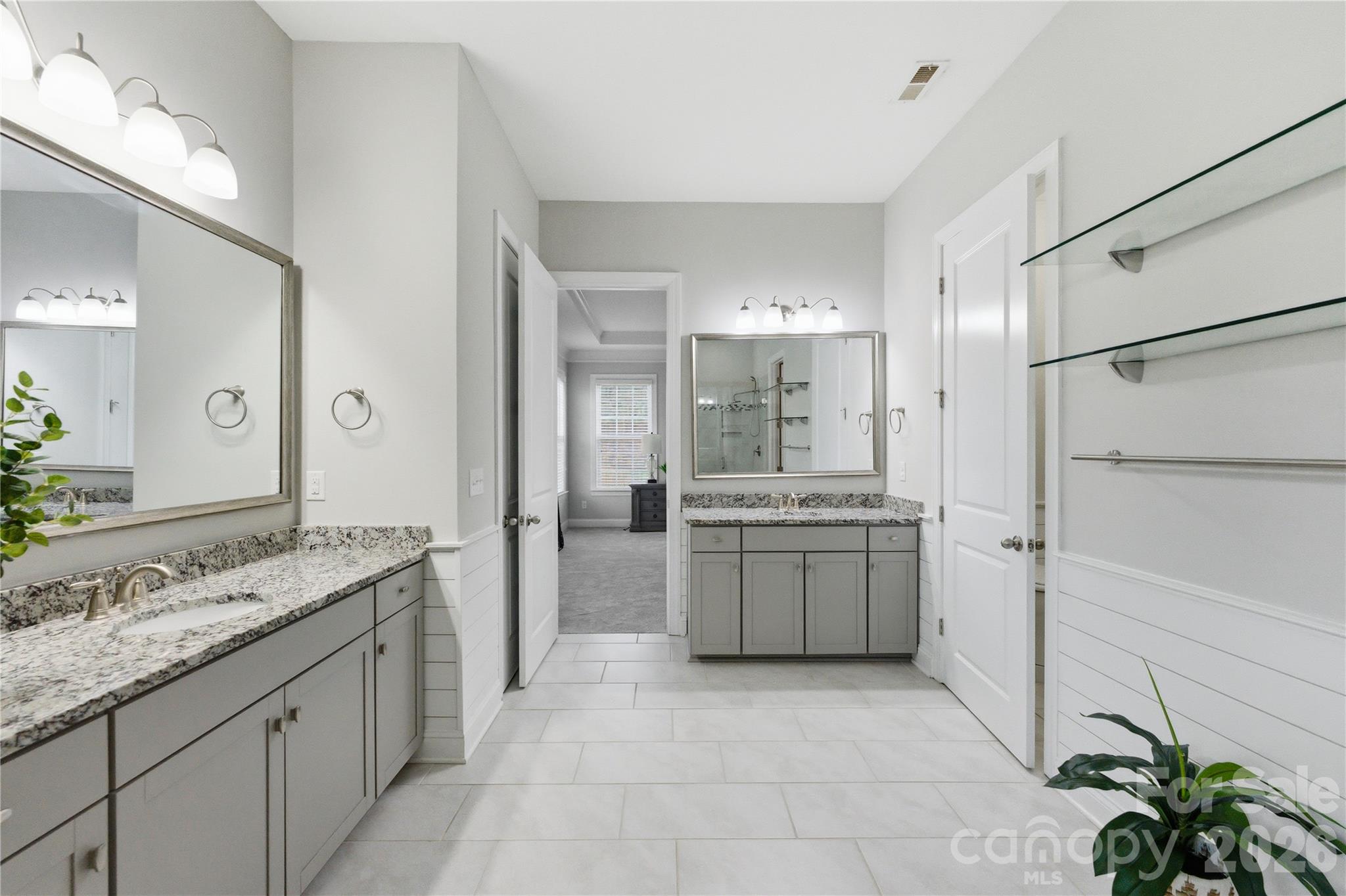 194 Forsythia Lane Tega Cay, SC 29708 - Photo 24 of 36 a large kitchen with a granite countertop sink and a refrigerator