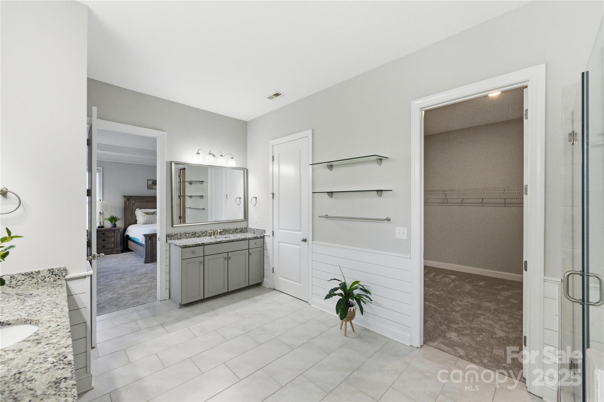 194 Forsythia Lane Tega Cay, SC 29708 - Photo 25 of 31 a large white kitchen with cabinets and stainless steel appliances
