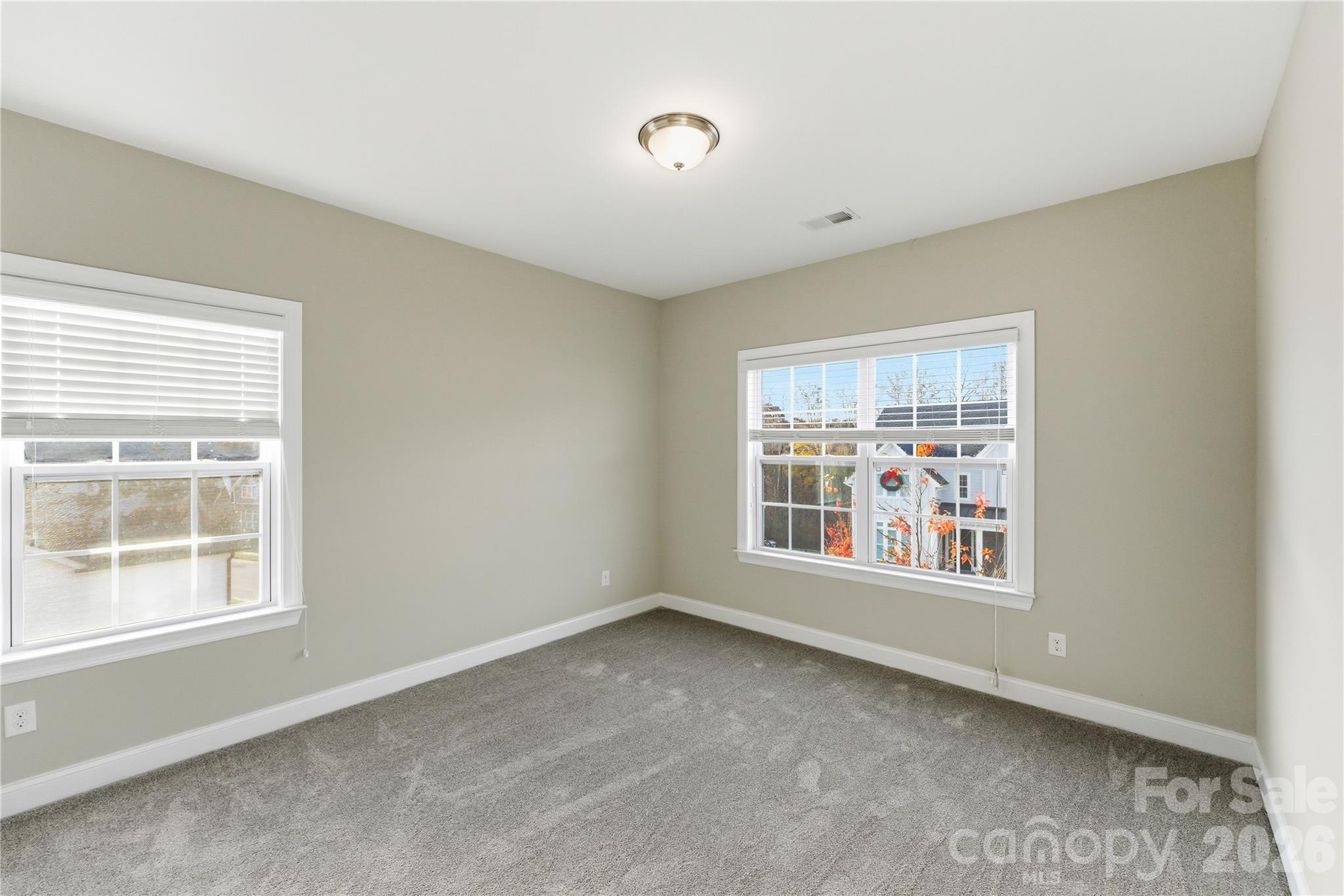 194 Forsythia Lane Tega Cay, SC 29708 - Photo 30 of 36 a view of an empty room with a window