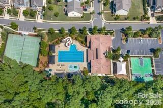 194 Forsythia Lane Tega Cay, SC 29708 - Photo 33 of 36 an aerial view of a house with a garden