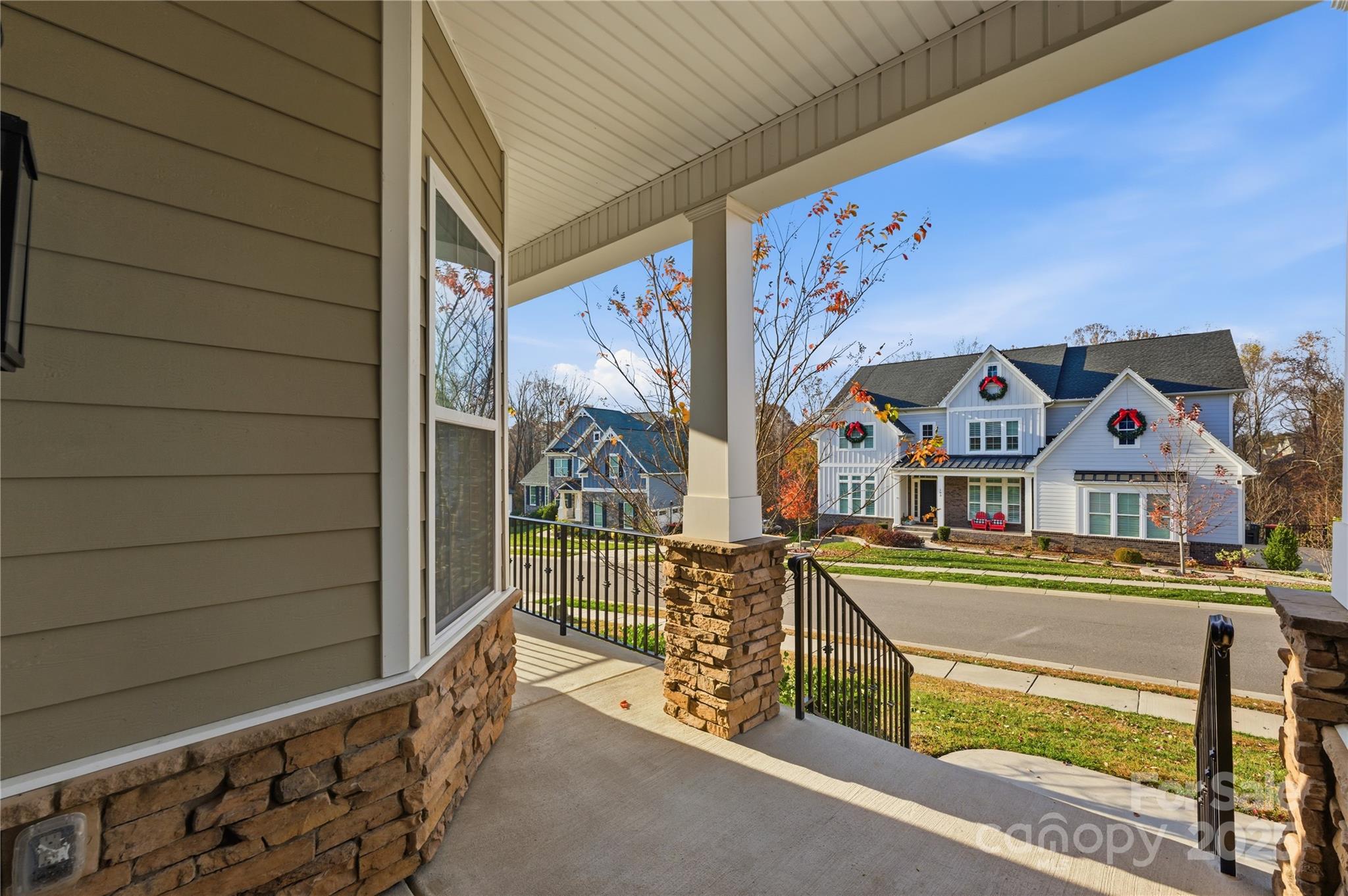 194 Forsythia Lane Tega Cay, SC 29708 - Photo 5 of 31 a view of a house with a wooden door