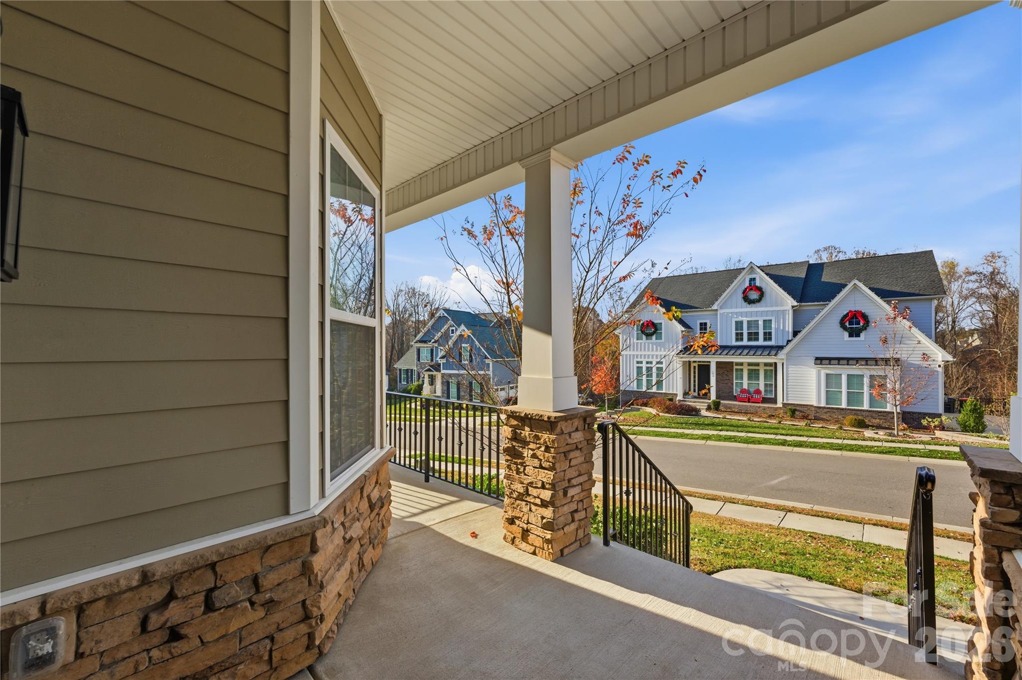 194 Forsythia Lane Tega Cay, SC 29708 - Photo 6 of 37 a view of a house with a wooden door