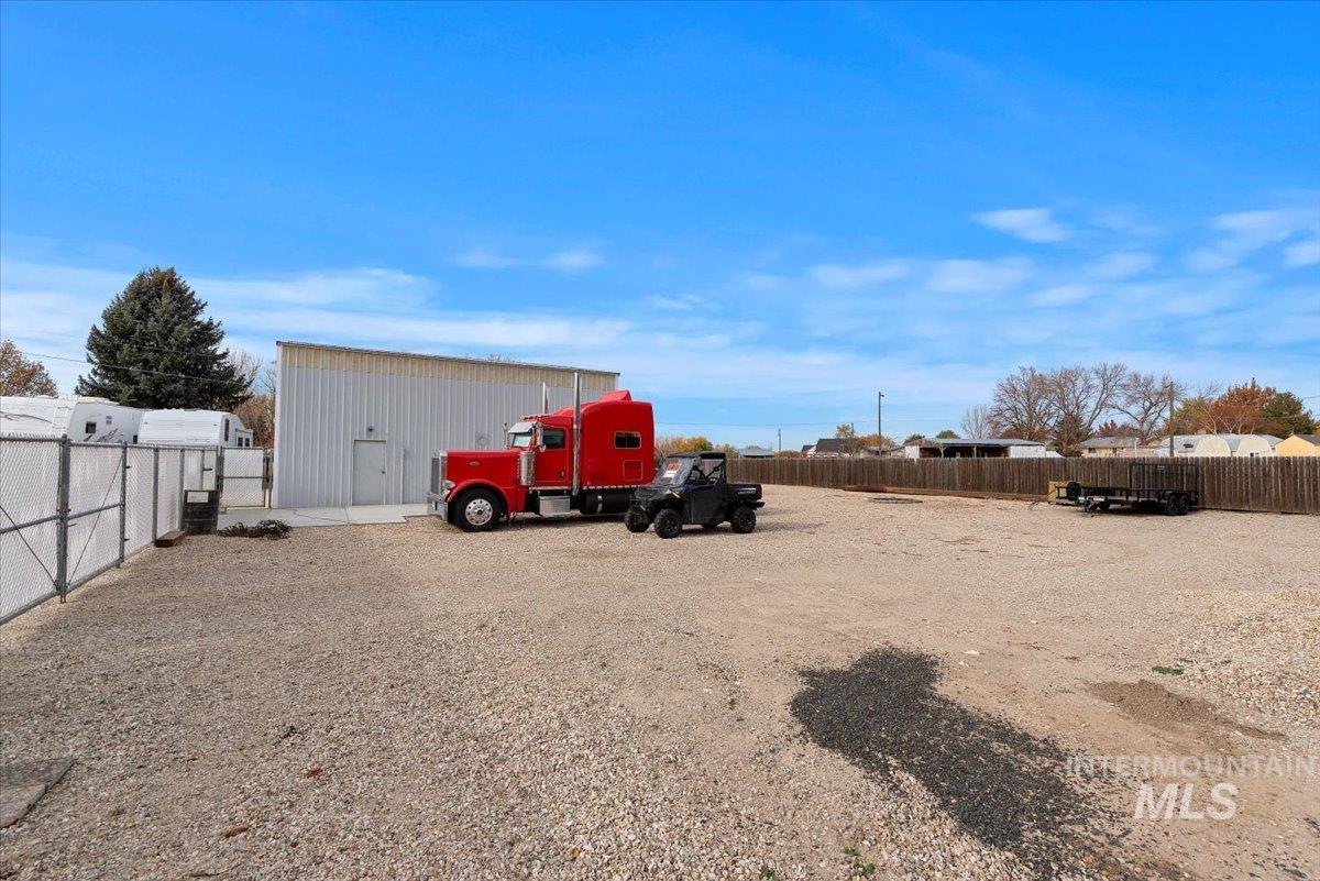 11650 Columbia Road Boise, ID 83709 - Photo 29 of 32 View of yard featuring an outdoor structure