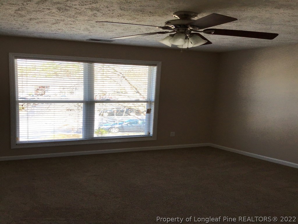 1913-4 Sardonyx Road Fayetteville, NC 28303 - Photo 9 of 12 a view of a livingroom with a window