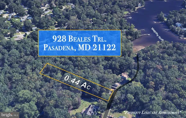 a view of outdoor space with signage and flags