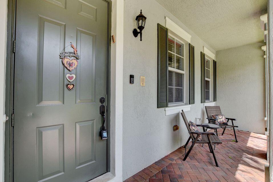 1029 Northwest 18th Avenue, Unit 1029 Boca Raton, FL 33431 - Photo 3 of 15 front 1029 patio