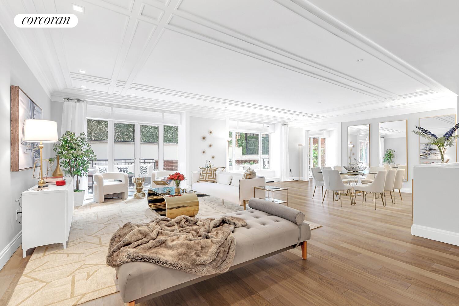 40 East 72nd Street, Unit MAIS Manhattan, NY 10021 - Photo 1 of 17 a living room with furniture or couch and a wooden floor