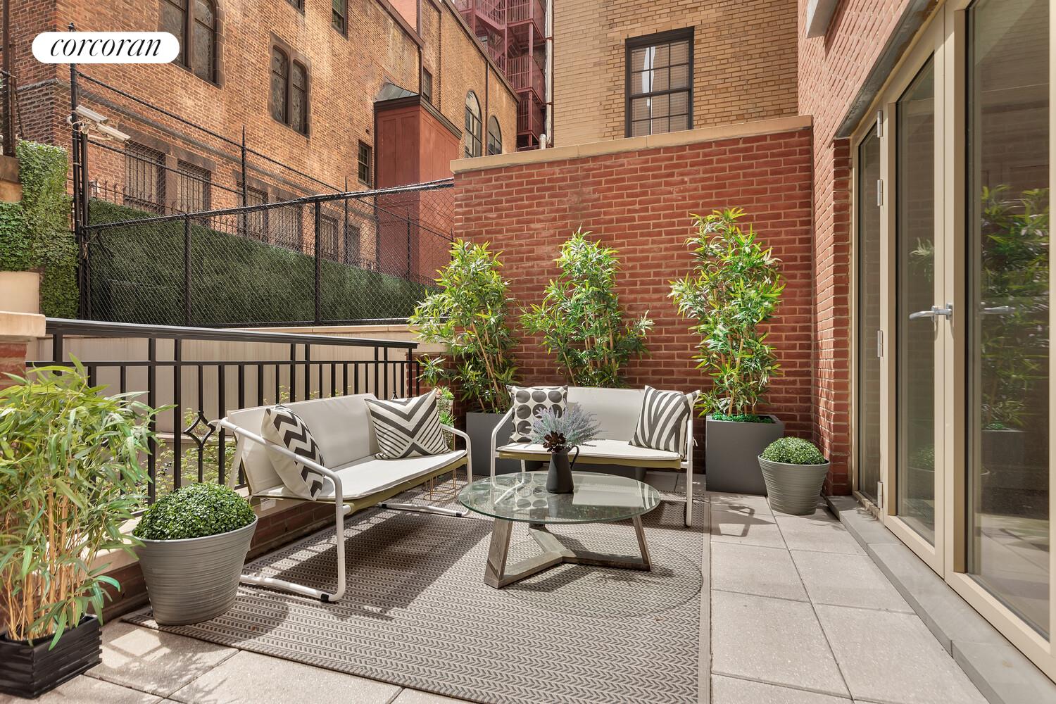 40 East 72nd Street, Unit MAIS Manhattan, NY 10021 - Photo 2 of 17 a view of a patio with a table and chairs