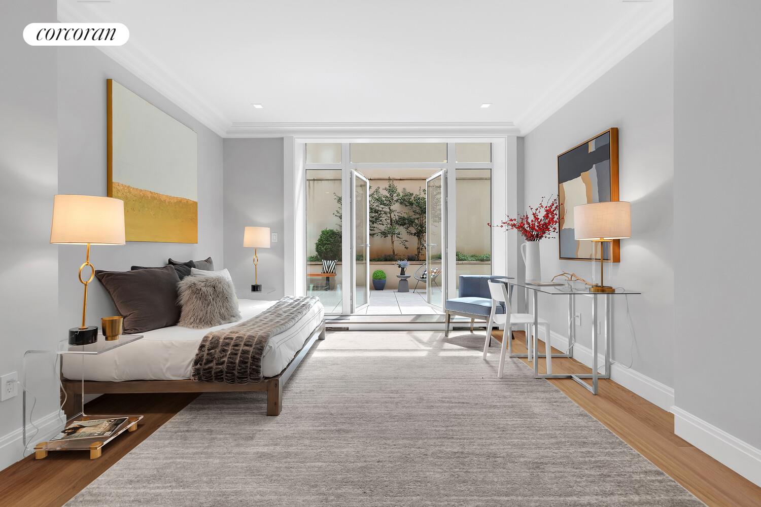 40 East 72nd Street, Unit MAIS Manhattan, NY 10021 - Photo 8 of 17 a living room with furniture and a lamp