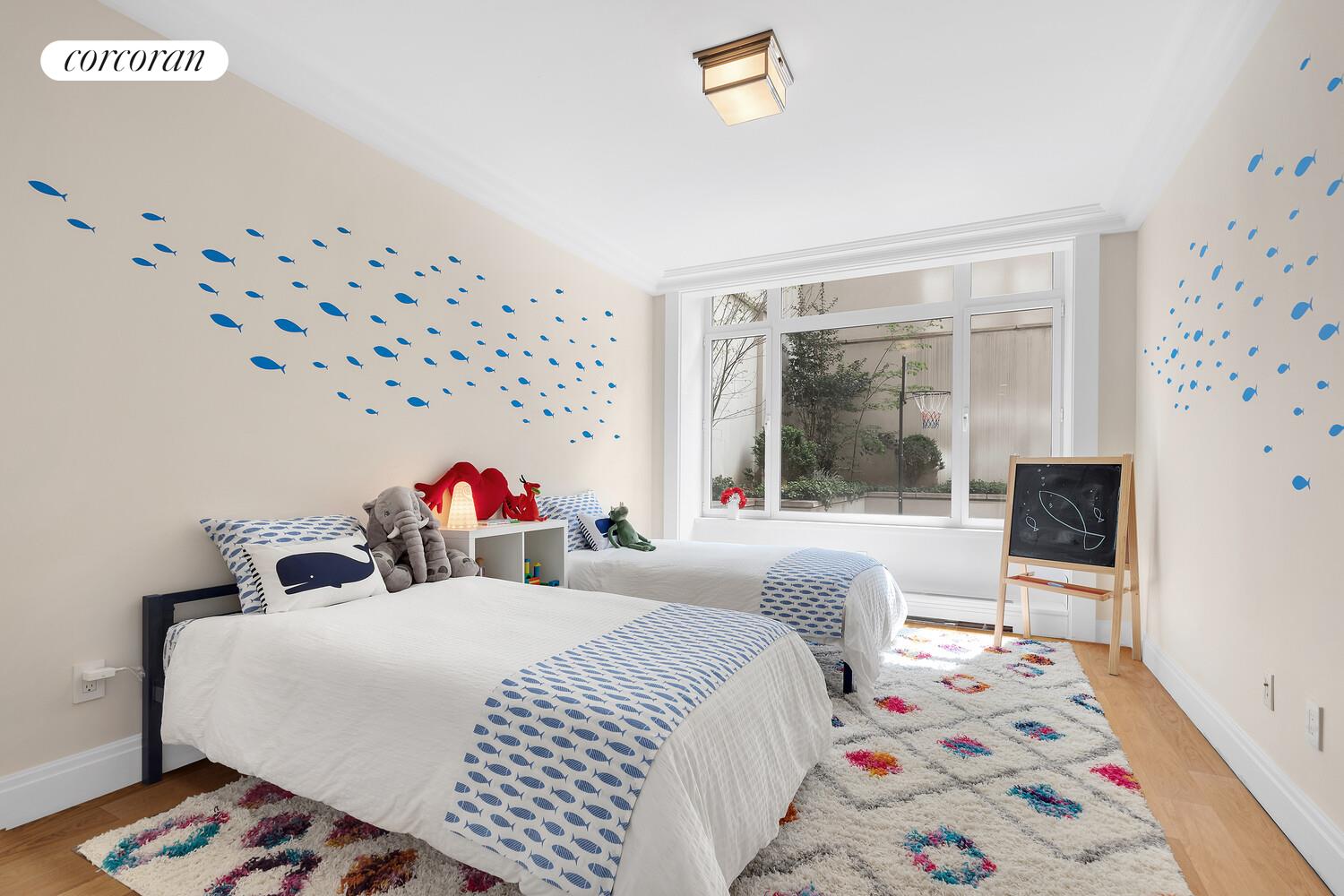 40 East 72nd Street, Unit MAIS Manhattan, NY 10021 - Photo 9 of 17 a bed room with a bed and a chair