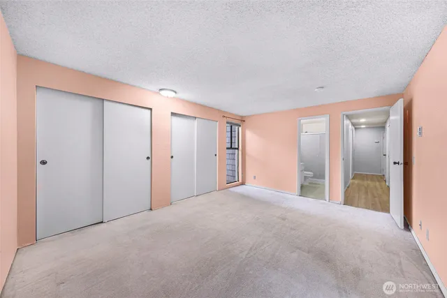 a view of a room with sliding glass door