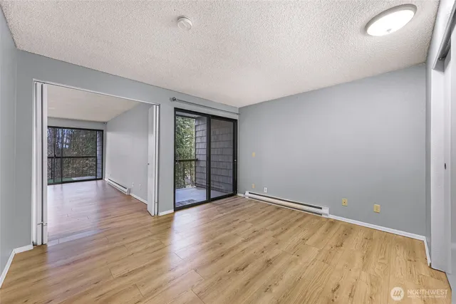 a workspace with furniture and wooden floor