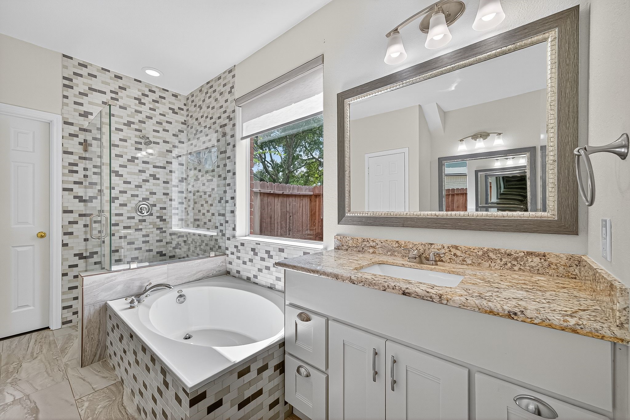 22406 Piper Terrace Lane Katy, TX 77450 - Photo 29 of 44 a bathroom with a sink and a bathtub