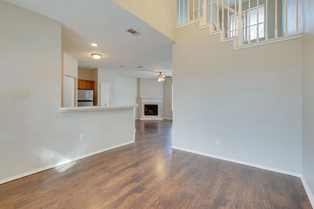 a view of a hallway with windows