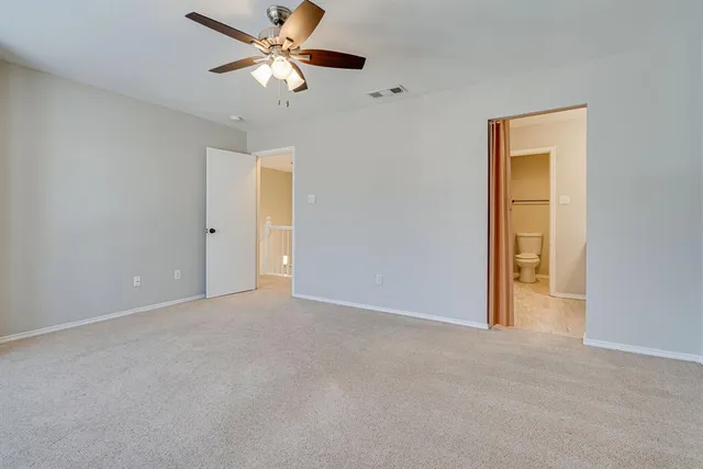 a bathroom with a sink vanity and mirror