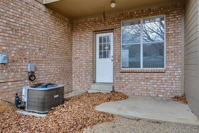 a front view of a house with garage