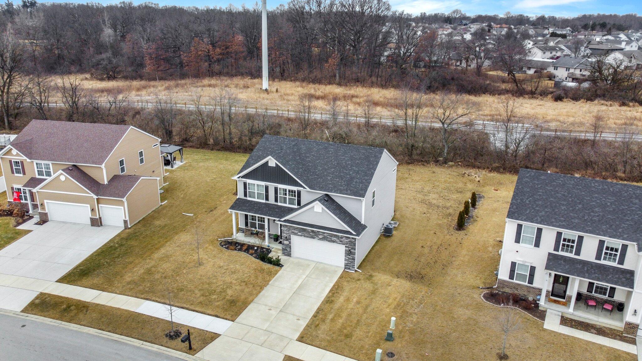 8766 Burr Rdg Circle Crown Point, IN 46307 - Photo 33 of 33 an aerial view of a house with a yard