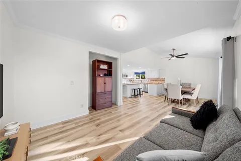 a view of a storage and utility room with washer and dryer