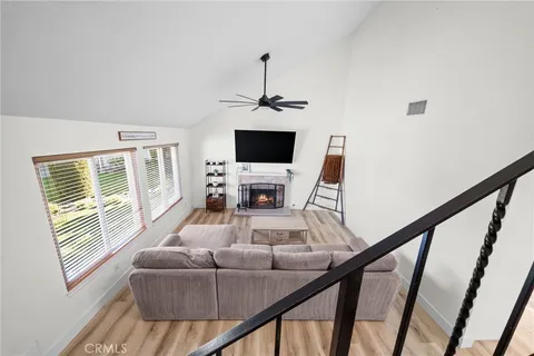 a bathroom with a toilet a sink a bathtub and a mirror