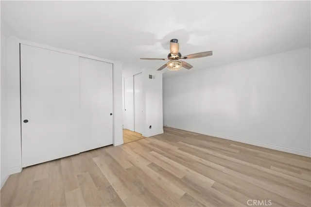 a bathroom with a shower a toilet and a sink