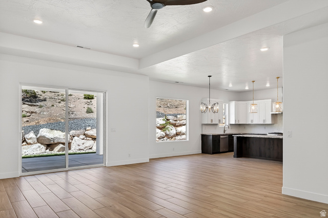 2862 South Mountain Rnch Road Cedar City, UT 84720 - Photo 6 of 64 Open-concept living space featuring wood-finish flooring, recessed lighting, and a modern ceiling fan