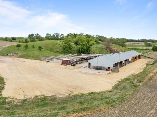 8294 North Leaf River Road Leaf River, IL 61047 - Photo 44 of 56 an aerial view of a house with big yard