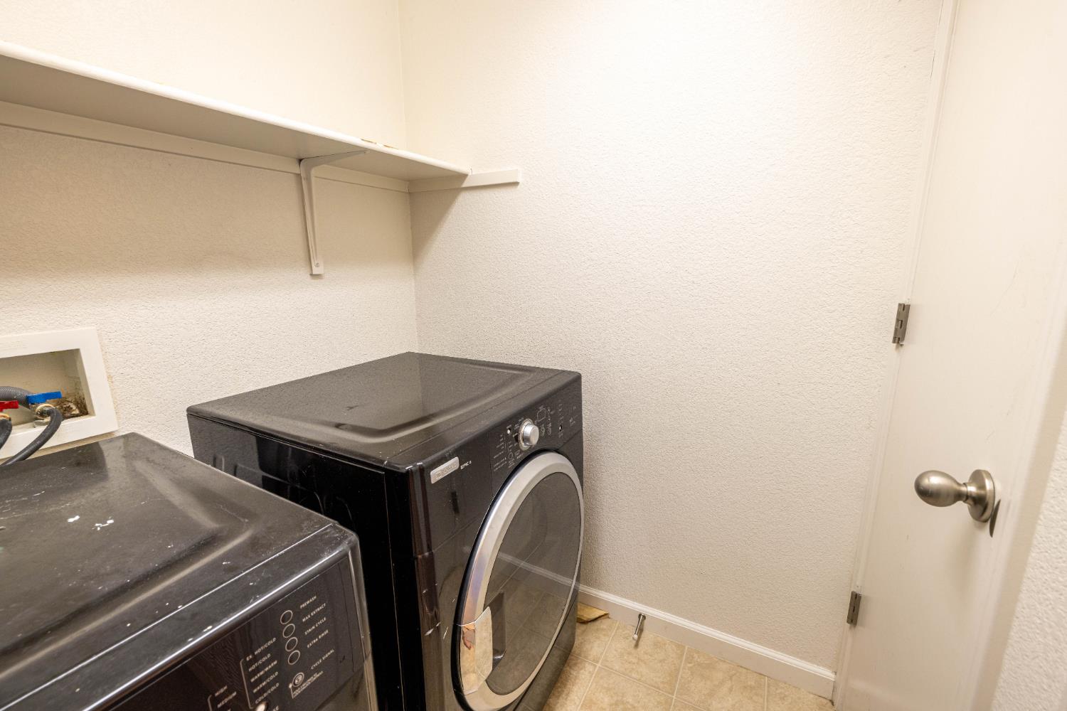 3122 Lea Sterling Way Rancho Cordova, CA 95670 - Photo 25 of 31 a utility room with dryer and washer