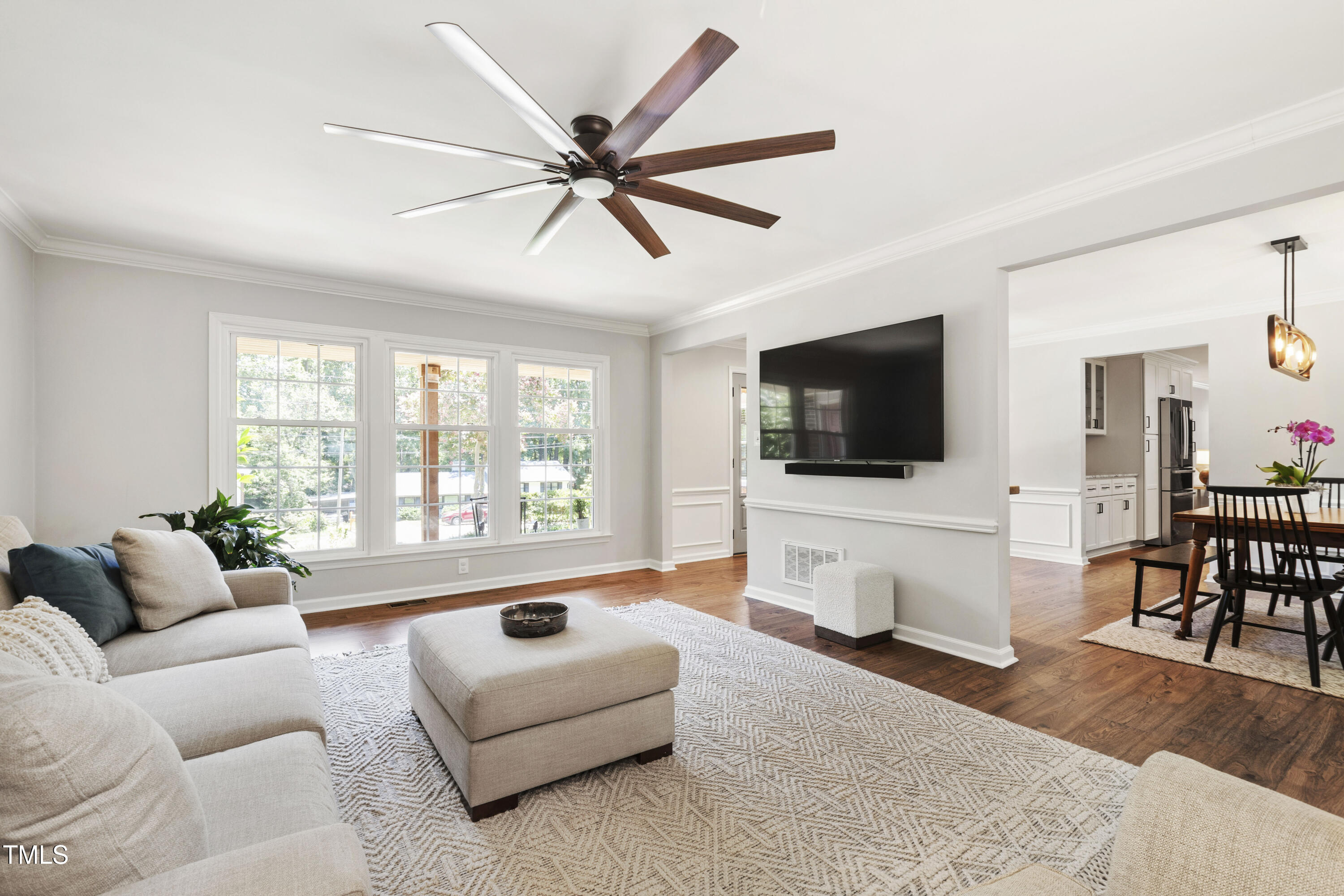 3209 Caldwell Drive Raleigh, NC 27607 - Photo 12 of 42 a living room with furniture and a flat screen tv