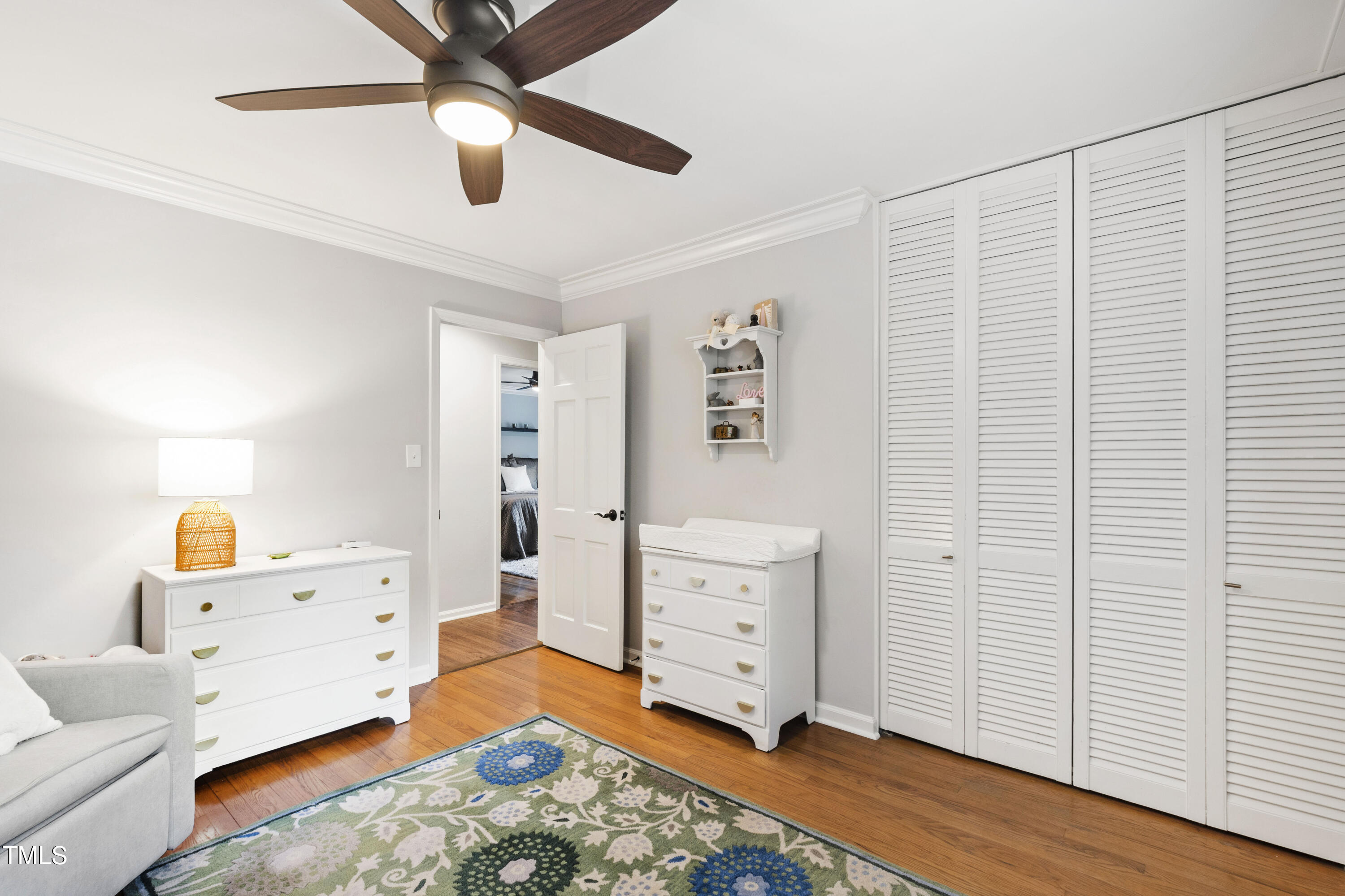 3209 Caldwell Drive Raleigh, NC 27607 - Photo 30 of 42 a bed room with a bed and a window