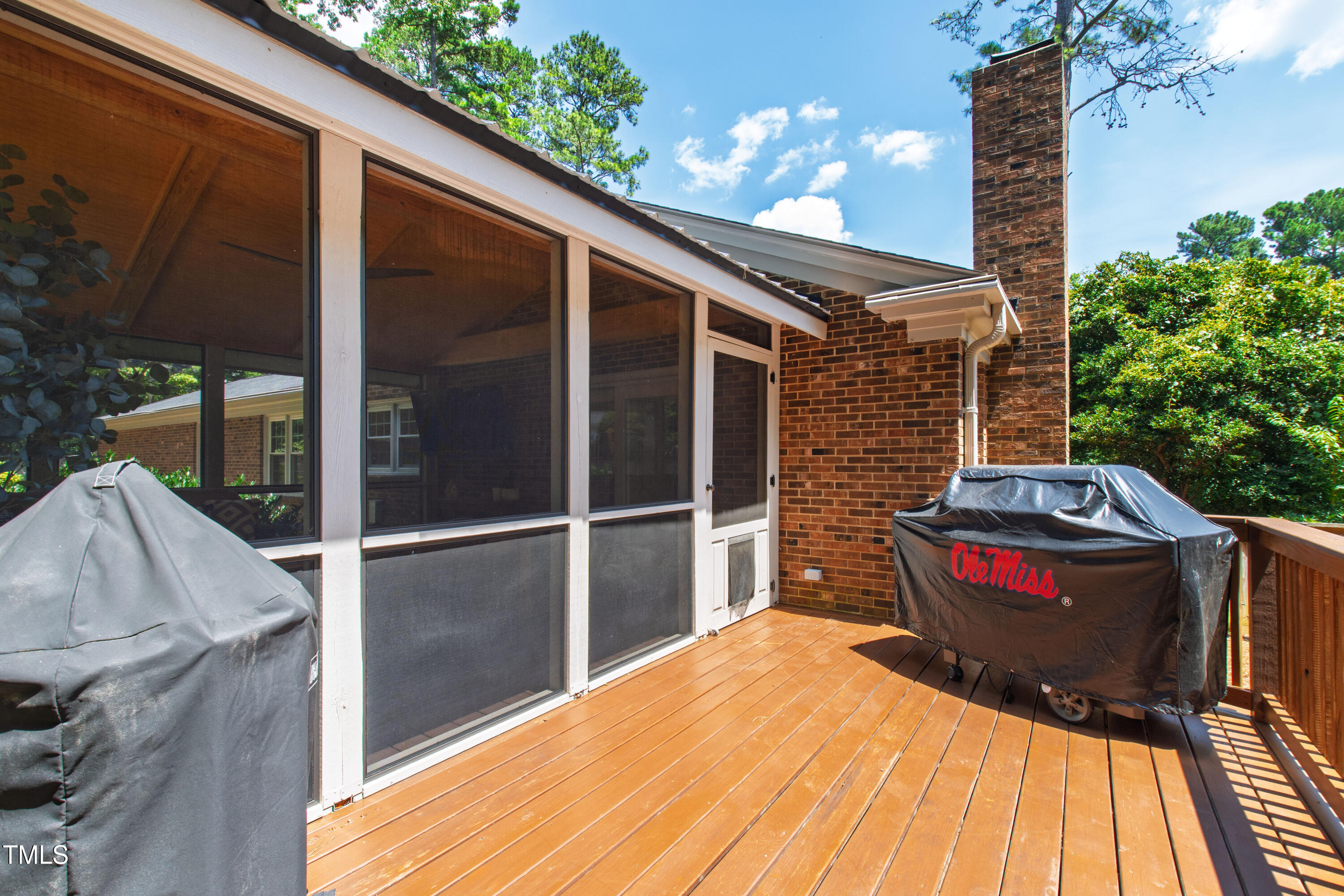 3209 Caldwell Drive Raleigh, NC 27607 - Photo 38 of 42 a backyard of a house with seating space