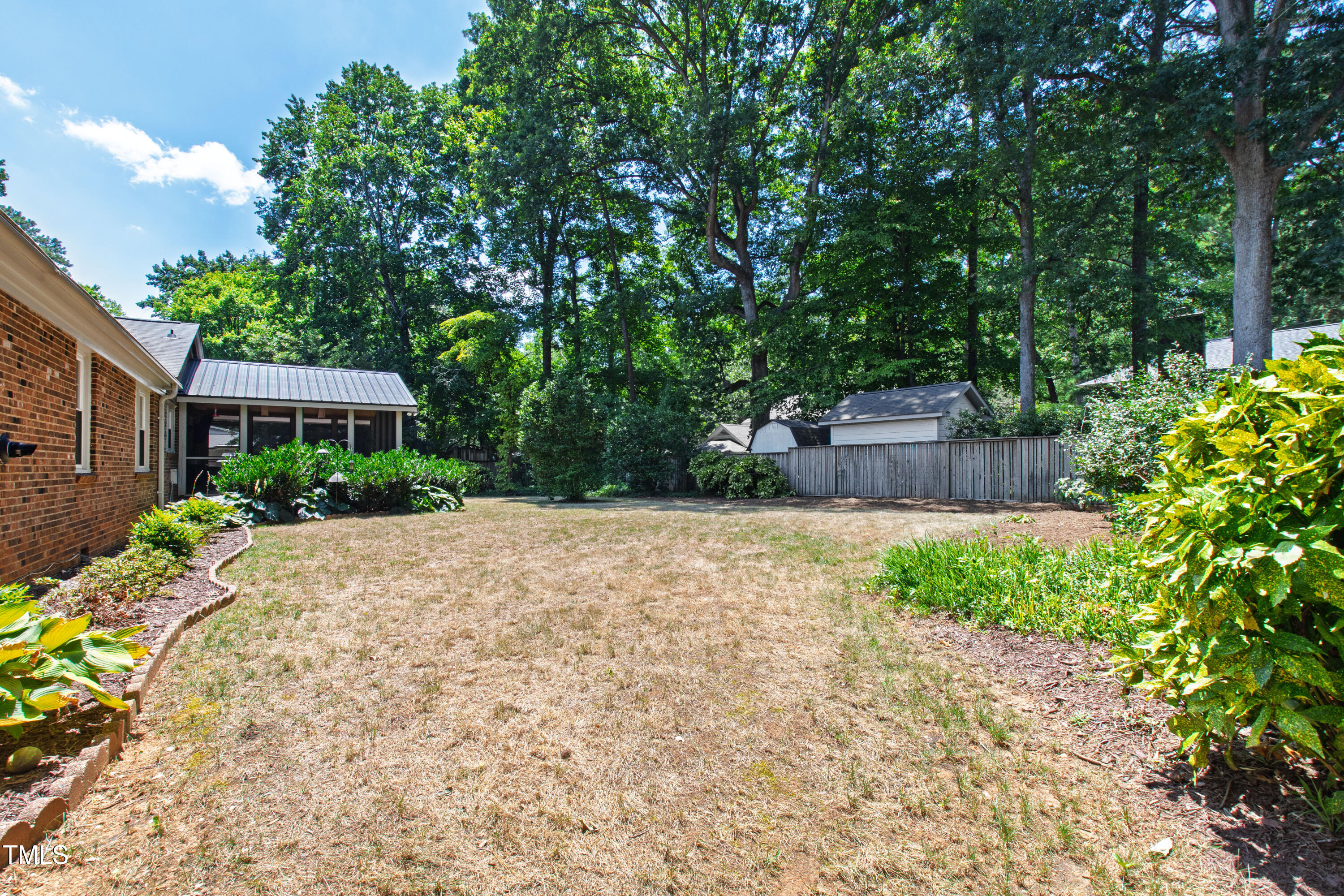 3209 Caldwell Drive Raleigh, NC 27607 - Photo 40 of 42 a front view of a house with a yard
